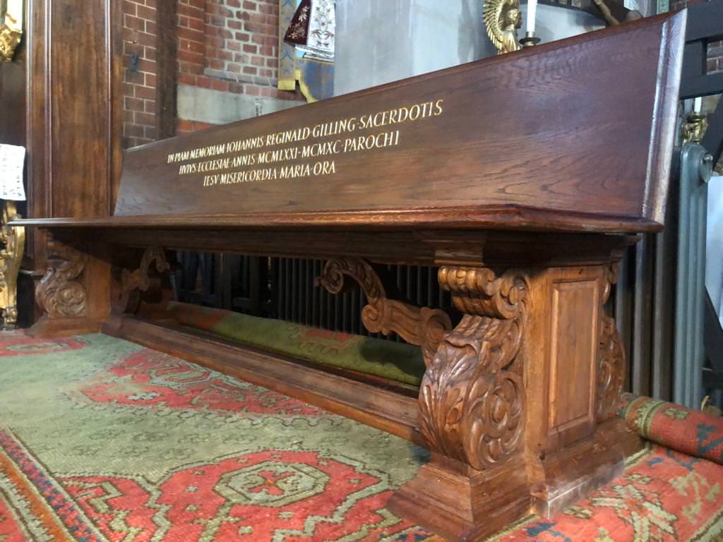 Bench carved, stained and polished to match an existing one, lettering carved and gilded